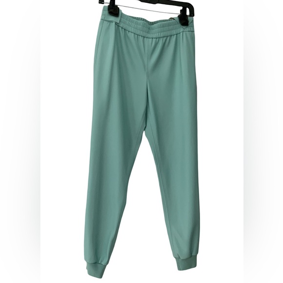 Shop Alice + Olivia Pete Faux Leather Jogger Pants in Breeze - Picture 2 of 11